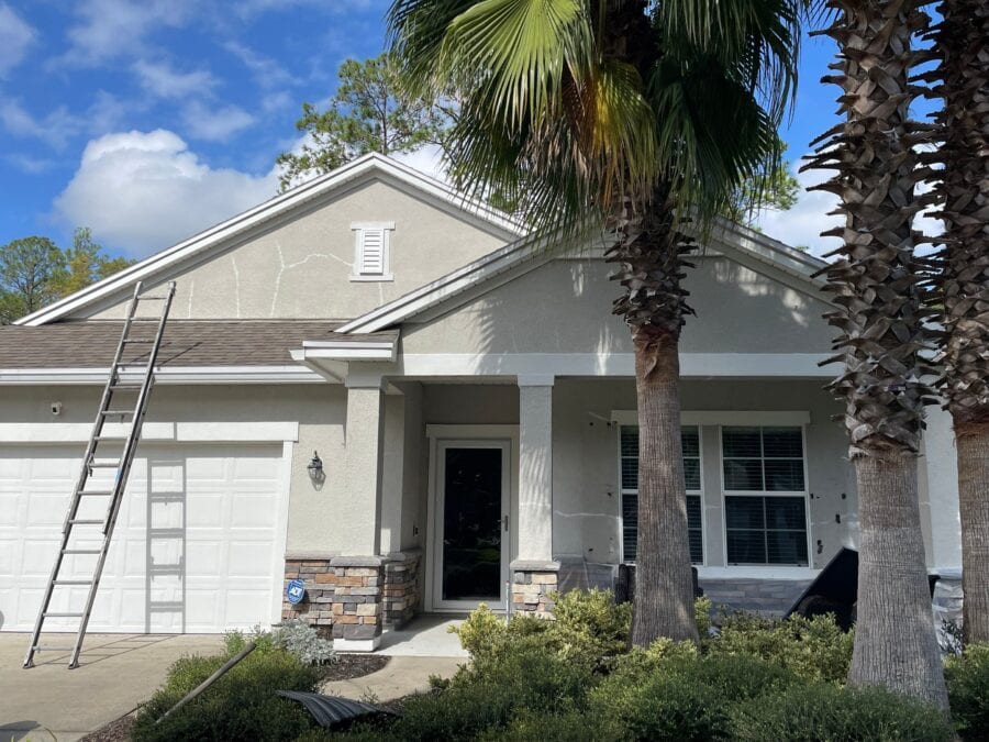 Home featured in case study that needs stucco repair. This is a before image. 