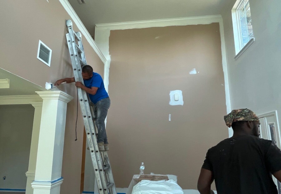 Bright Side team working on interior walls