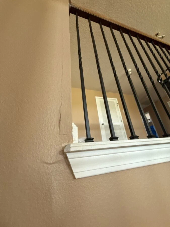 before image of the interior walls with damage