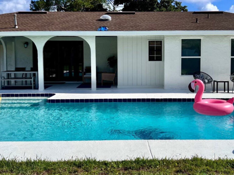 After exterior image of a white house