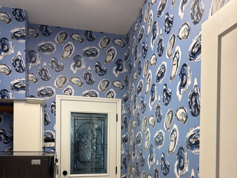 laundry room wallpaper installation featuring oyster wallpaper in blue scheme
