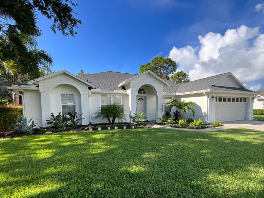 brick exterior paint project after white paint job