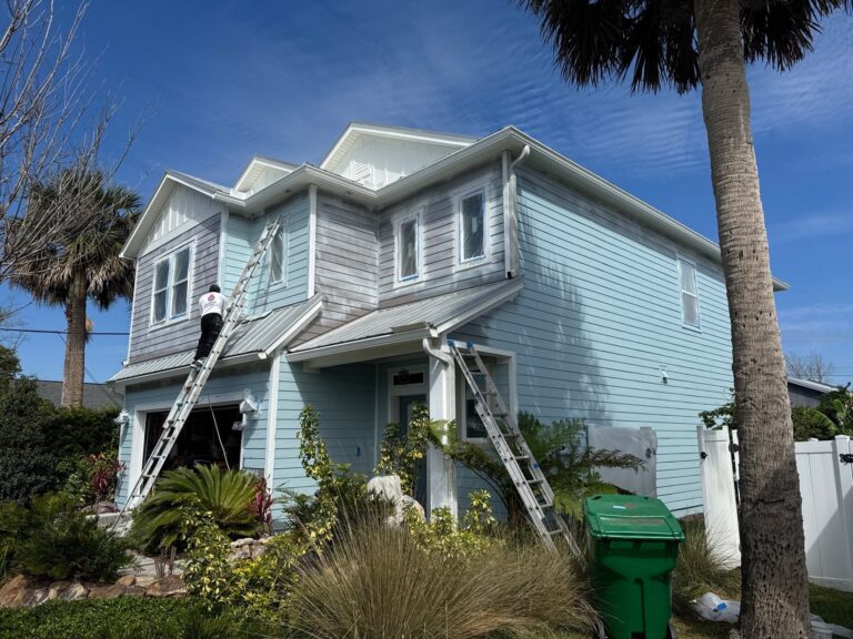 progress photo of a south jacksonville home being painted coastal blue