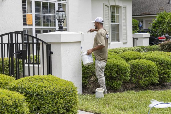 Painting Featured Image-w1080-h1920 man painting side of building