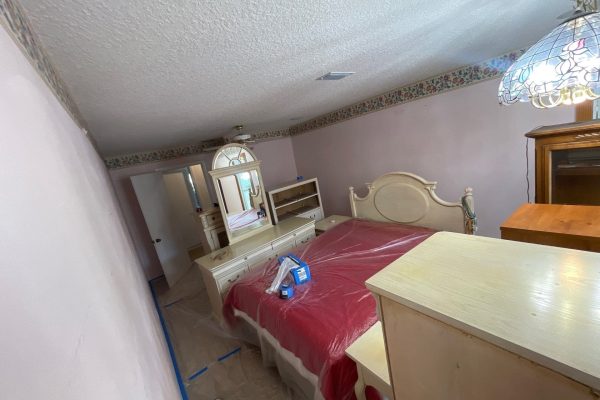 before image of bedroom interior before paint job