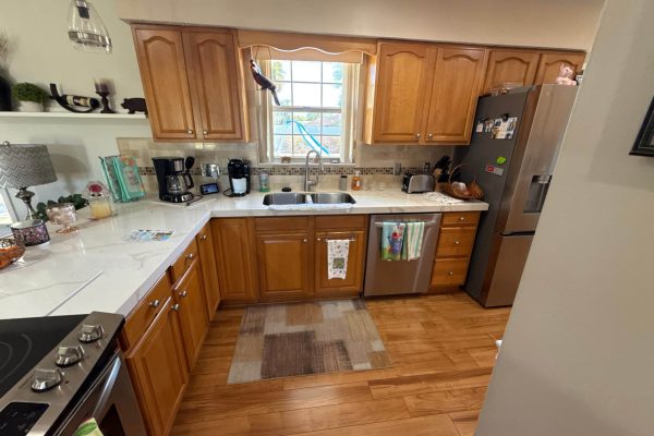 wooden kitchen cabinets before fresh paint