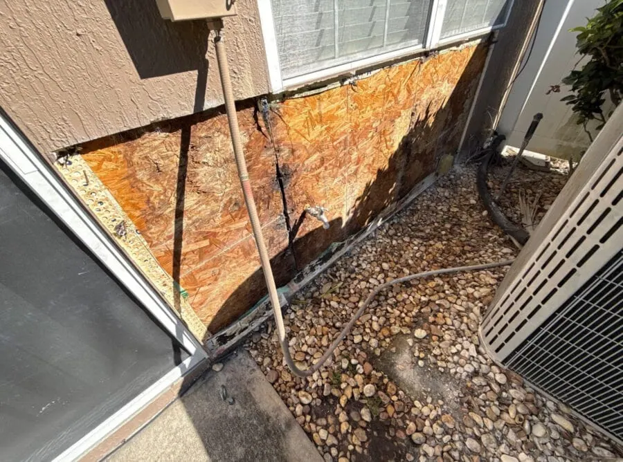 image of stucco repair process on side of a house